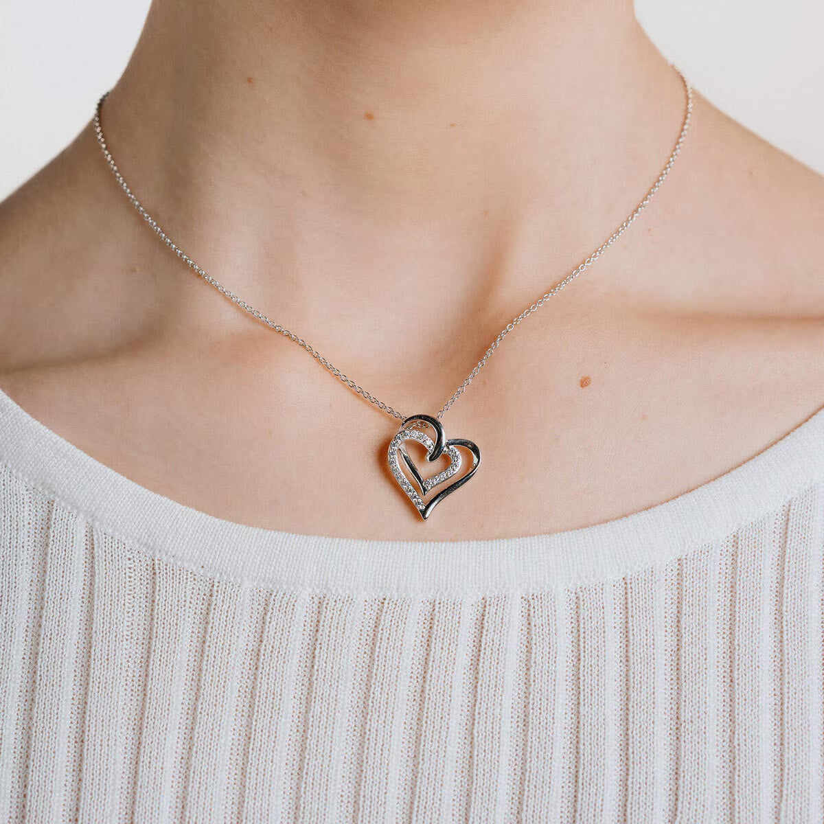 Sterling Silver Cubic Zirconia Overlaid Hearts Necklace
